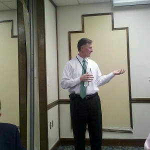 Jerry Stidham, chapter president, opens the March luncheon meeting and introduces the guest speaker.